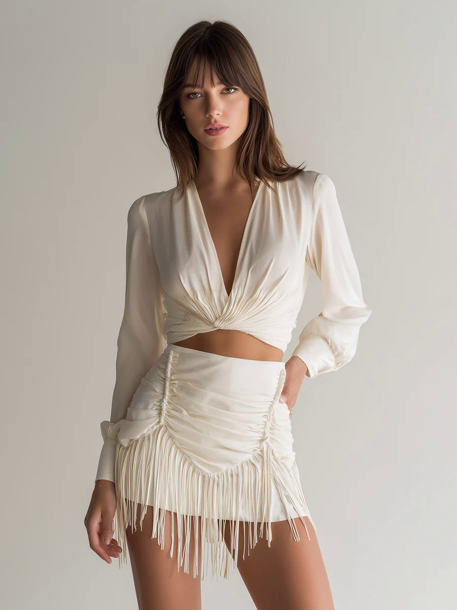 Simple And Elegant V-Neck Long Sleeve Top And Smocked Tassel Skirt Set